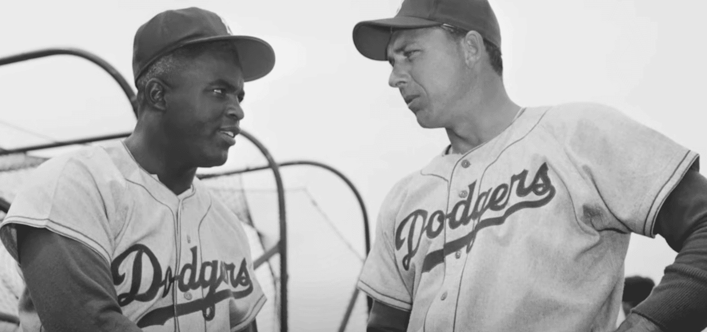 Gil Hodges in action, showcasing his impressive skills as a key player for the Brooklyn Dodgers.
